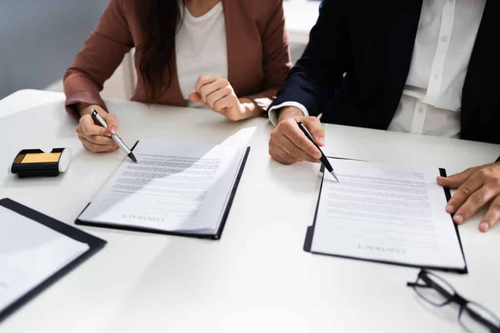 Lawyer People Review Document Before Signing